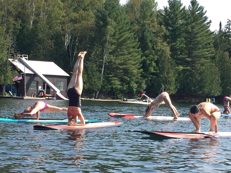 SUP yoga class taught by Merin Peretta.